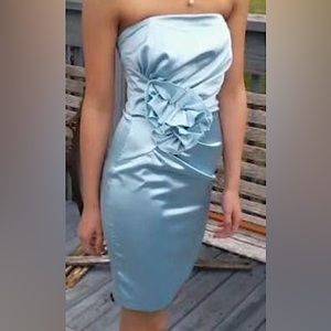 Blue (prom) dress. Size 0. Bought, tried on, never worn after. Condition is new.